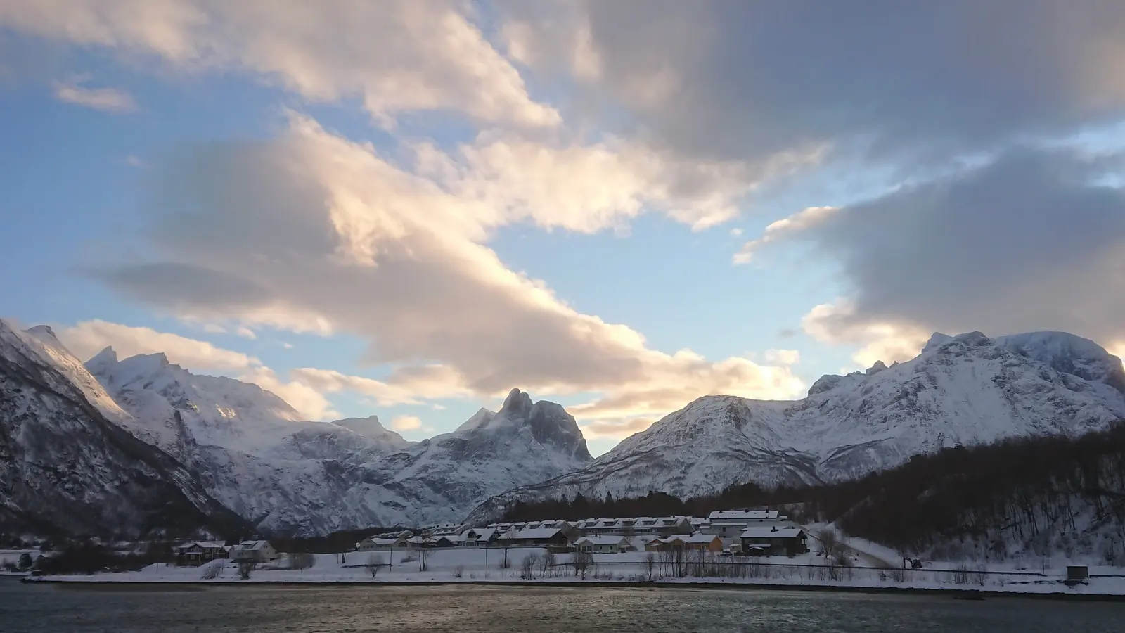 The Romsdalen valley in Norway, steep peaks rising above the valley floor and river