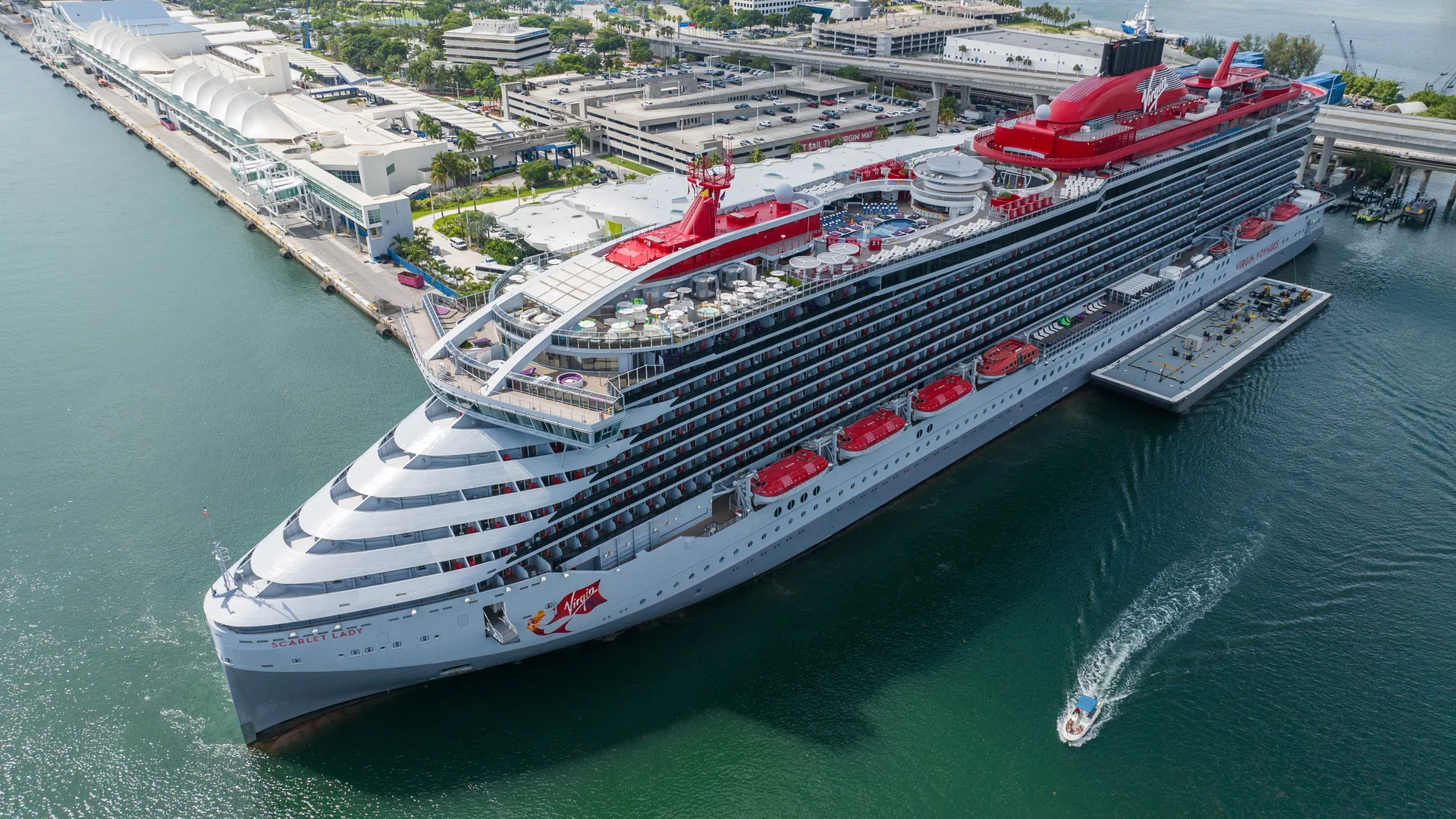 Virgin Voyages' Scarlet Lady berthed at the PortMiami cruise terminal, seen from the air