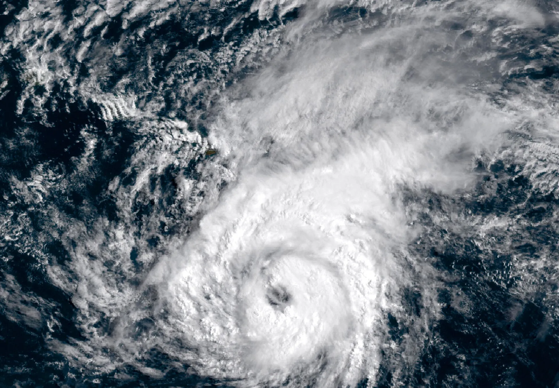 GOES-18 satellite image of Lala approaching the Hawaiian islands on 15 August 2026, with the island chain visible at upper left