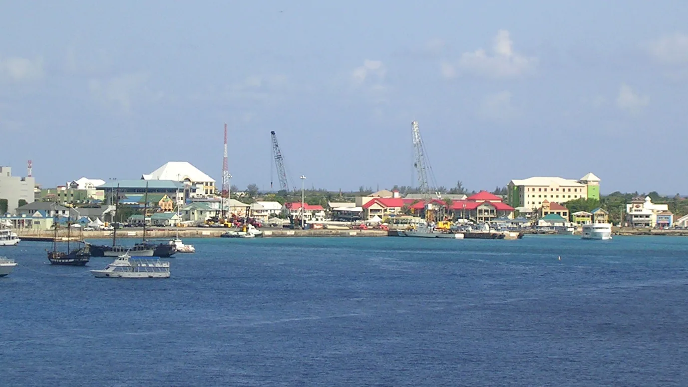 George Town harbour seen from a cruise ship at anchor, with tender boats working the waterfront
