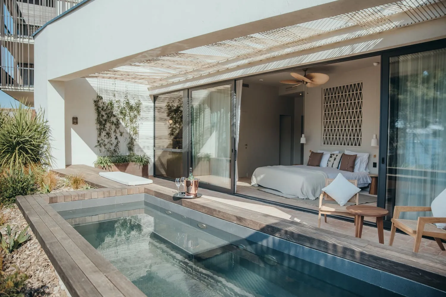 A minimalist suite terrace with a private pool overlooking the Adriatic at Maslina Resort, Hvar
