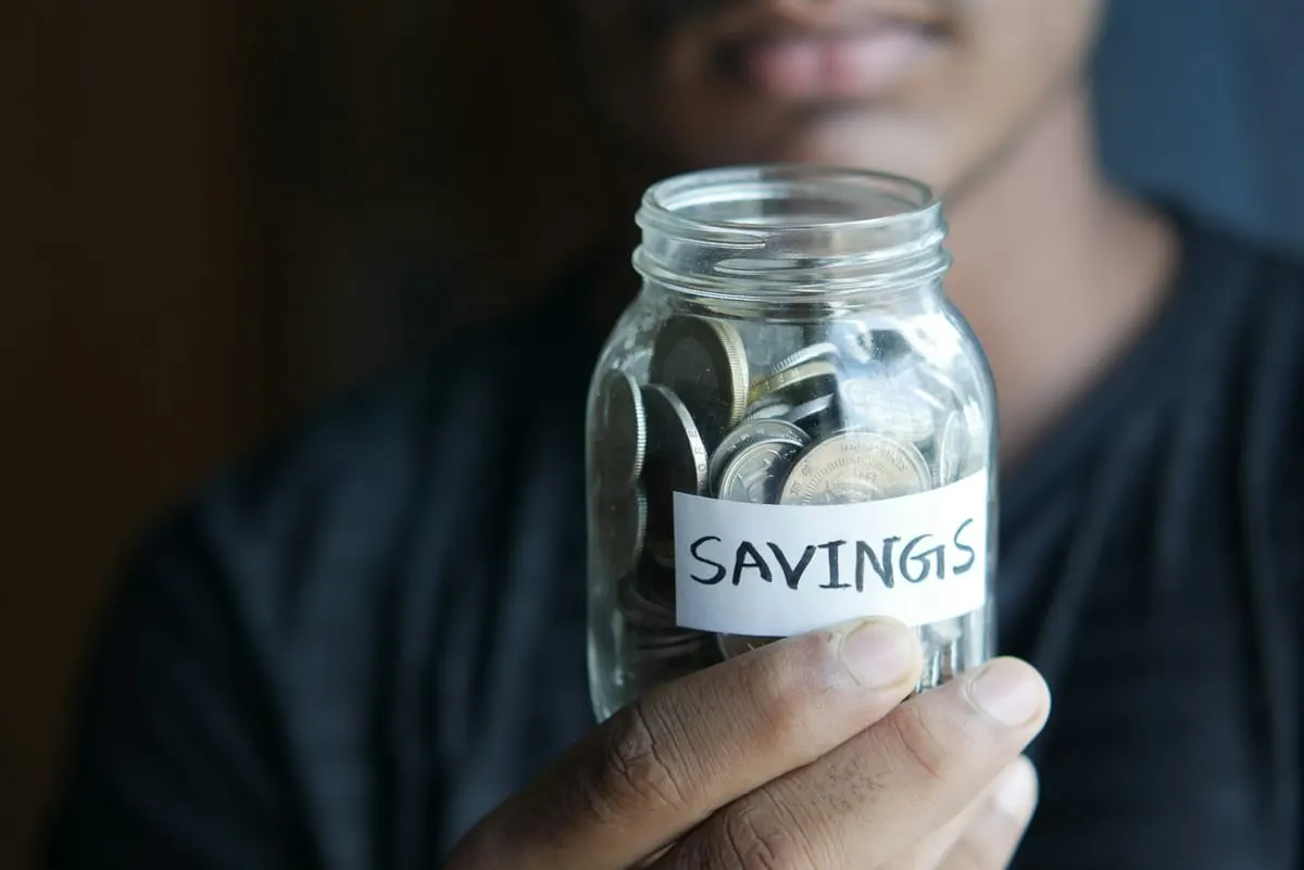 Coins stacked beside a notebook — planning ahead is the new way to protect value