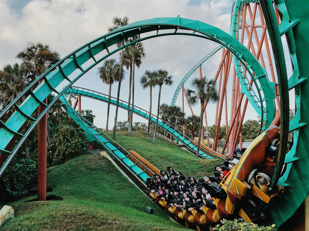 A theme park at night — cruise lines now benchmark themselves against land vacations