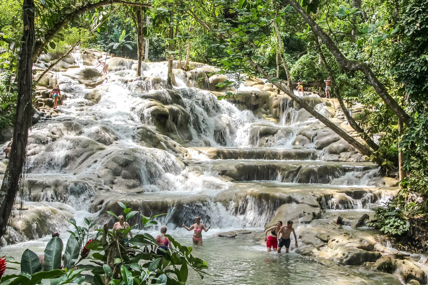 Visitors climbing Dunn's River Falls near Ocho Rios, Jamaica