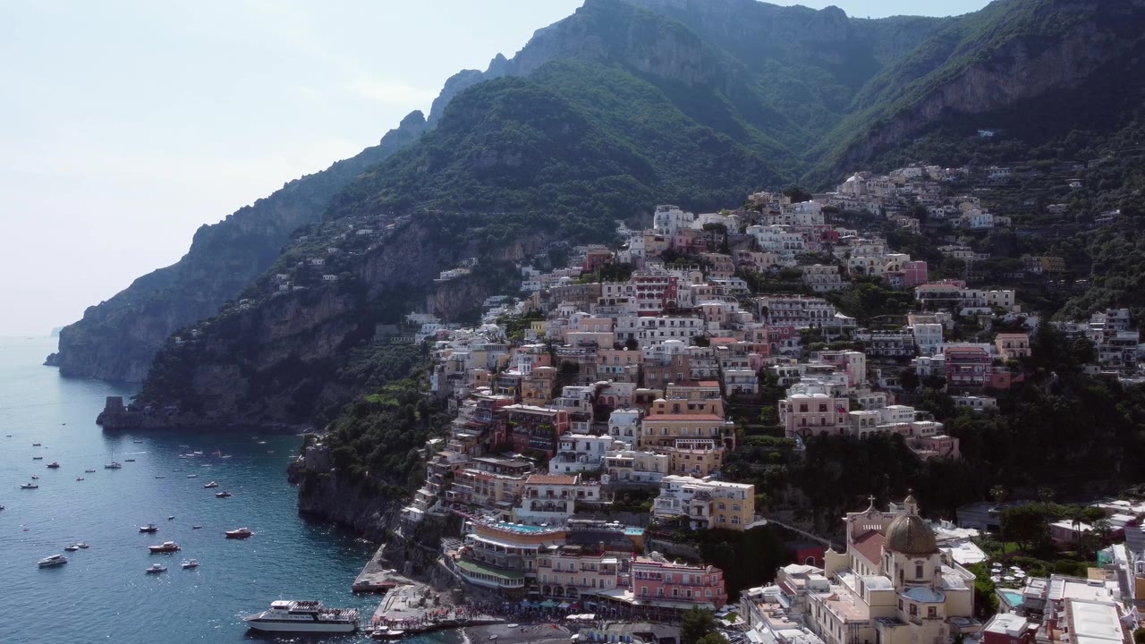 Off The Grid Getaways planning services — Positano coastline at golden hour, the kind of destination a good travel advisor makes real